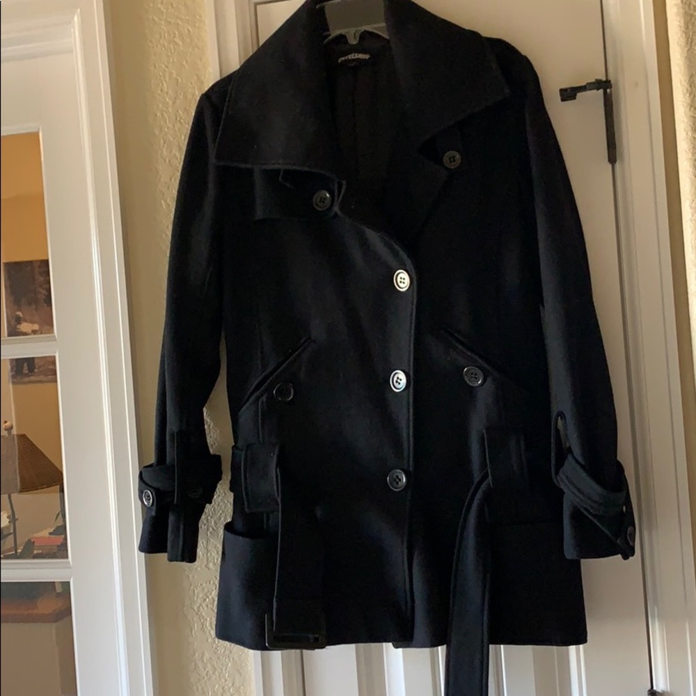 Women’s black wool coat.